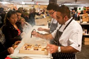 Chef Sid Sahrawat from Sidart smokes his tuna bruschetta when showing audiences how he 'Uses his Loaf' at the Loaf & Weston Milling Baking Theatre